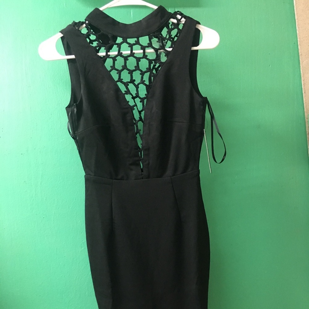 Black lattice bodycon dress. Size - XS